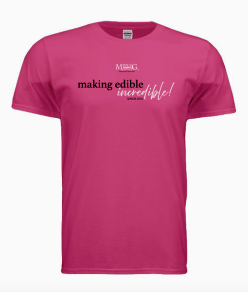 “Making Edible Incredible” T-Shirt — Raspberry — Support Safe + Delicious Baking